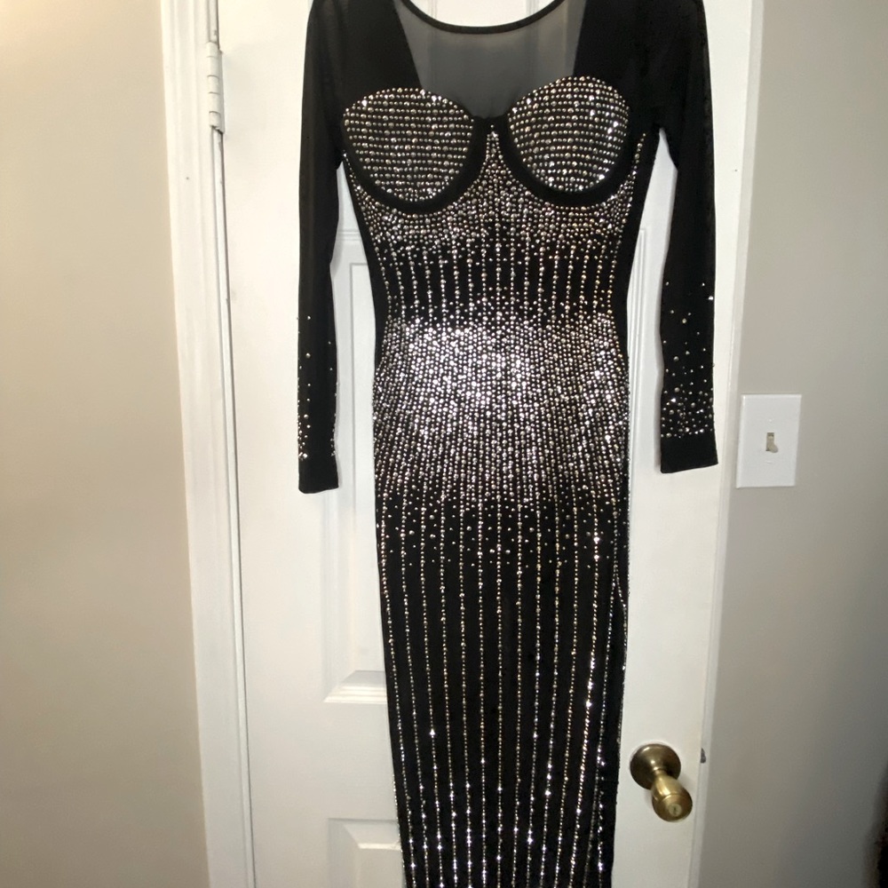 This is a never worn bedazzled black and silver sexy sheet dress!